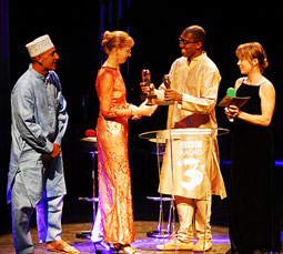 Yusuf Mahmoud & Hildegard Kiel receiving the World Shaker Award from presenters Kwame Kwei-Armah and Verity Sharp in London (photo: BBC Radio 3)